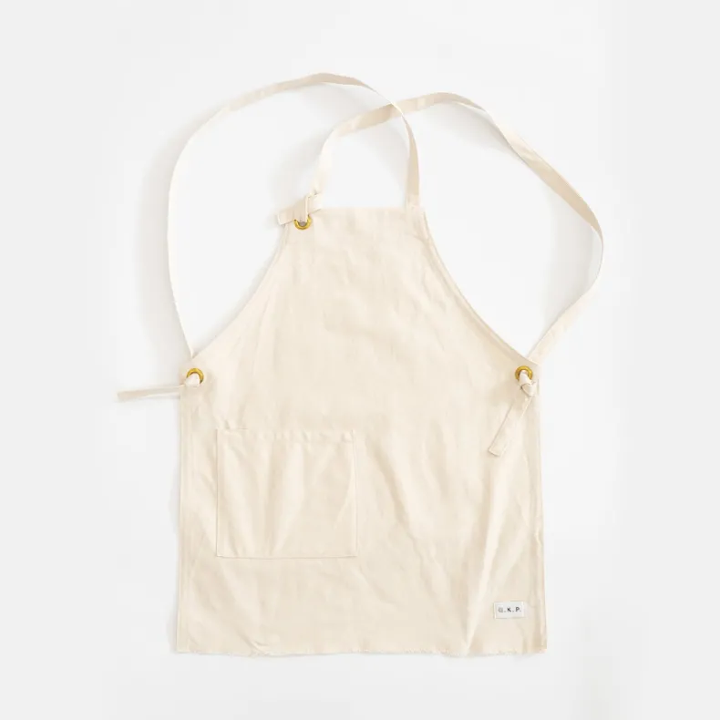 G.K.P Shorter Slip-On Style Apron with fringe finish : Organic Cotton