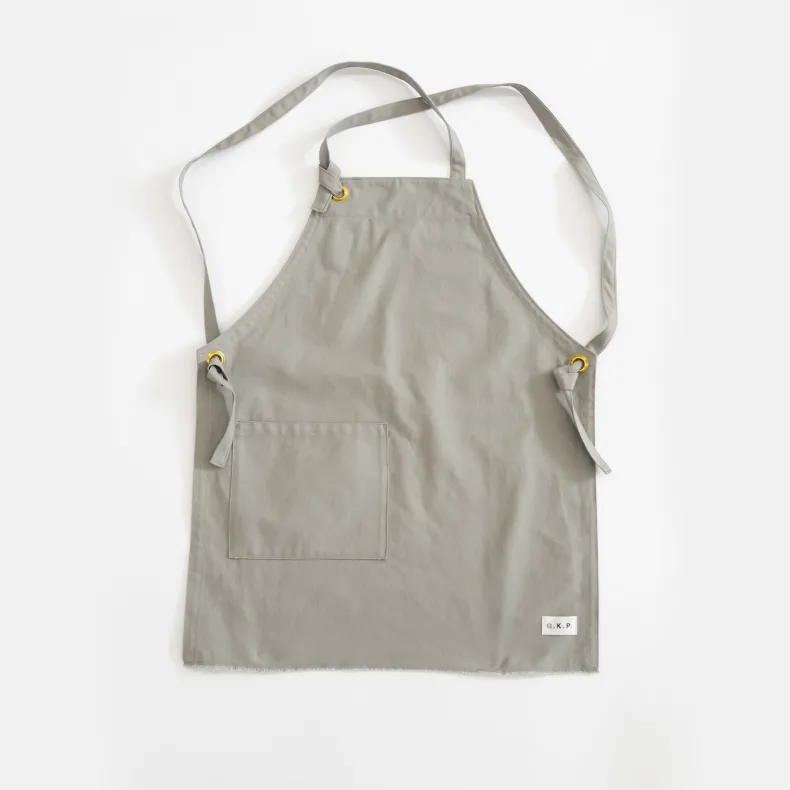 G.K.P Shorter Slip-On Style Apron with fringe finish : Organic Cotton
