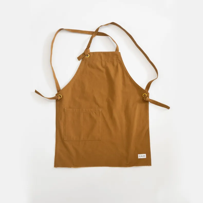 G.K.P Shorter Slip-On Style Apron with fringe finish : Organic Cotton