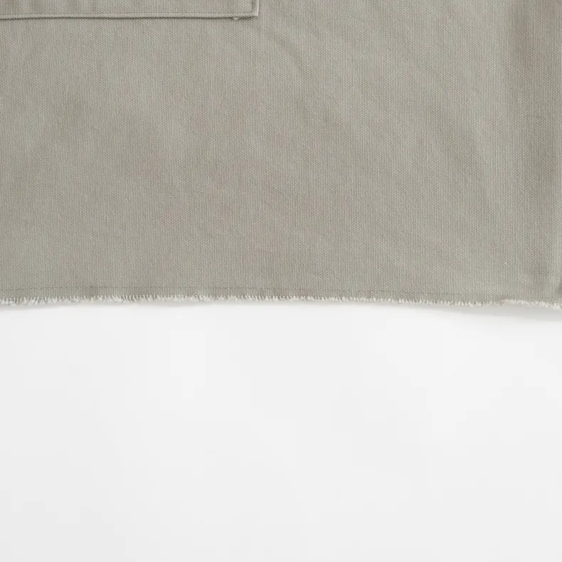 G.K.P Shorter Slip-On Style Apron with fringe finish : Organic Cotton